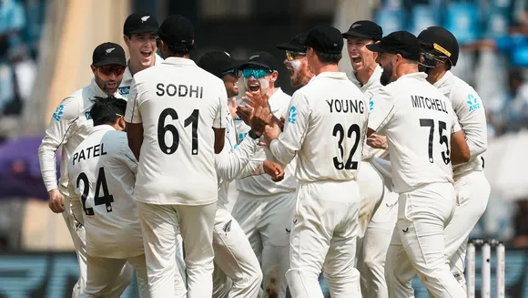 New Zealand's players celebrate the wicket of India's Rishabh Pant during day three of third Test cricket match between India and New Zealand at Wankhede Stadium, in Mumbai, Sunday, Nov. 3, 2024