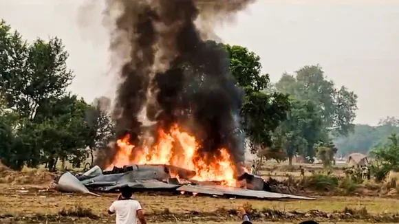 Smoke billows out after an IAF plane crashed, near Agra, Monday, Nov. 4, 2024.