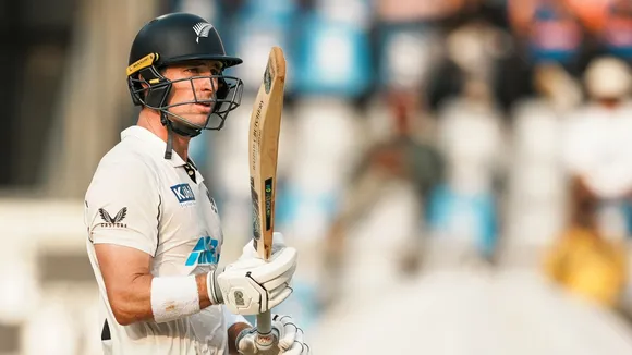 New Zealand's Will Young celebrates his half century on the second day of the third test cricket match between India and New Zealand, at the Wankhede Stadium, in Mumbai, Saturday, Nov. 2, 2024.