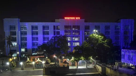 Newly-built modern complex of the Patna Collectorate along the banks of Ganga river illuminated ahead of the 'Chhath Puja' festival, in Patna, Sunday, Nov. 3, 2024.