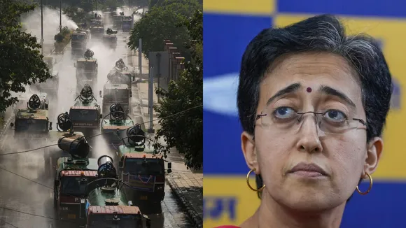 Anti-smog guns being used to sprinkle water amid air pollution, in New Delhi