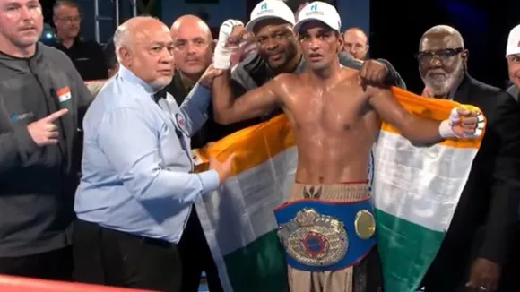Indian professional boxer Mandeep Jangra won the World Boxing Federation's super featherweight world title after defeating Britain's Conor McIntosh in the Cayman Islands
