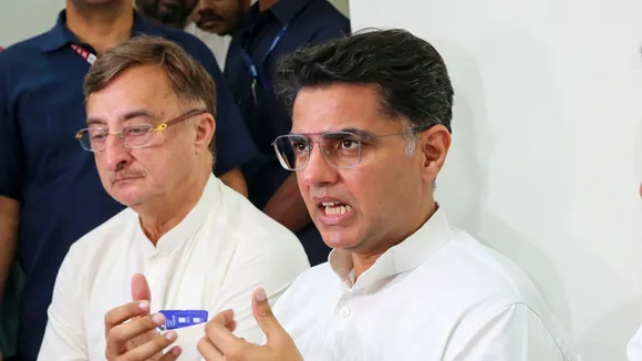 Congress leader Sachin Pilot with Rajya Sabha MP Vivek Tankha and Madhya Pradesh party President Jitendra Patwari addresses a press conference, in Bhopal, Thursday, Nov. 7, 2024.