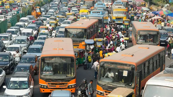 Vehicles stuck in a traffic jam at Anand Vihar, in New Delhi