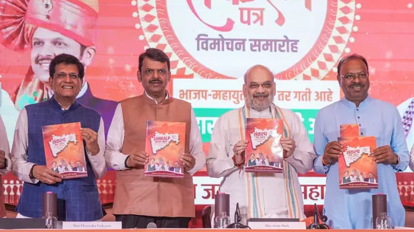 Union Ministers Amit Shah and Piyush Goyal, and Maharashtra Deputy Chief Minister Devendra Fadnavis release the party's manifesto for Maharashtra Assembly elections, in Mumbai, Sunday, Nov. 10, 2024.