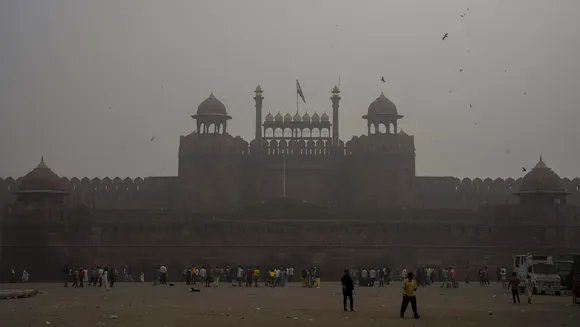 Visitors at the Red Fort amid fog, in New Delhi, Wednesday, Nov. 13, 2024.