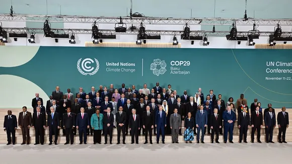 World leaders attending the United Nations climate change conference, known as COP29, pose for a family photo in Baku, Azerbaijan