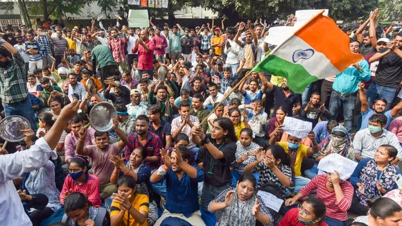 Aspirants stage a protest against UPPSC, demanding the implementation of 'Single Day, Single Sheet' exams, in Prayagraj, Thursday, Nov. 14, 2024.