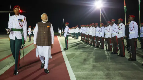 Prime Minister Narendra Modi inspects a Guard of Honour upon his arrival at the airport, in Georgetown, Guyana.