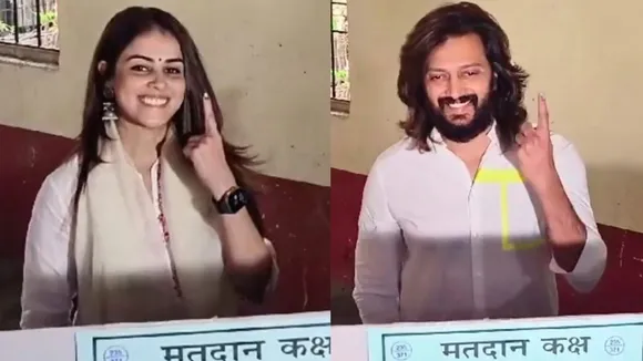 Actor Genelia shows her finger marked with indelible ink after casting vote during the Maharashtra Assembly elections, in Latur district, Wednesday, Nov. 20, 2024