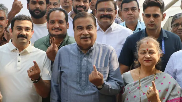 Union Minister Nitin Gadkari and his family members show their fingers marked with indelible ink after casting votes during the Maharashtra Assembly elections, in Nagpur, Wednesday, Nov. 20, 2024.