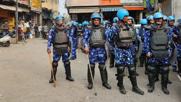 RAF personnel guard in a violence-hit area a day after clashes and stone pelting incidents over the survey of the Jama mosque, in Sambhal, Monday, Nov. 25, 2024