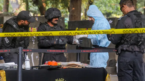 Security personnel conduct investigation at the site after a blast was reported near a PVR at Prashant Vihar area, in New Delhi, Thursday, Nov. 28, 2024.