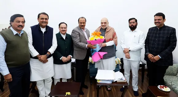 Amit Shah, JP Nadda, Devendra Fadnavis, Eknath Shinde and Ajit Pawar exchange greetings during a meeting at Nadda's residence, in New Delhi, Thursday, Nov. 28, 2024.
