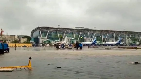 An area at the airport is seen inundated with rainwater at the airport amid heavy rainfall, in Chennai, Saturday, Nov. 30, 2024.
