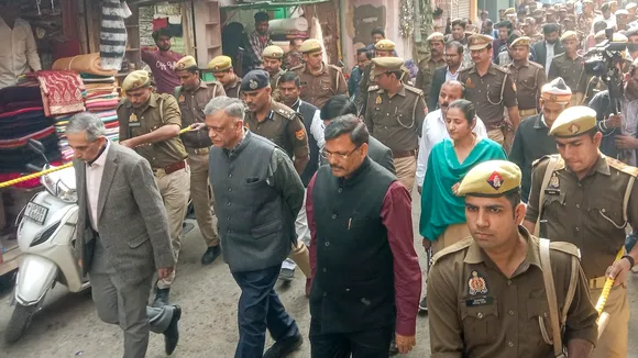A three-member judicial commission comprising retired Allahabad High Court judge Devendra Kumar Arora, retired IAS officer Amit Mohan Prasad and retired IPS officer Arvind Kumar Jain visits the Shahi Jama Masjid, in Sambhal, Uttar Pradesh, Sunday, Dec. 1, 2024.
