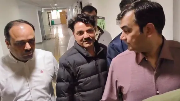 AAP MLA Naresh Balyan (center) being produced in the Rouse Avenue Court, in New Delhi, Tuesday, Dec. 3, 2024.