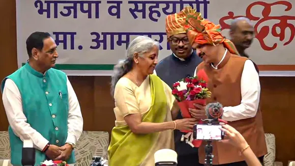 Nirmala Sitharaman felicitates BJP leader Devendra Fadnavis after he was unanimously elected as the Maharashtra BJP legislature party leader at its meeting, in Mumbai.