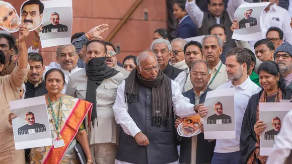 LoP in the Rajya Sabha Mallikarjun Kharge with LoP in the Lok Sabha Rahul Gandhi and other opposition MPs stages a protest over the Adani issue and Manipur unrest during the Winter session of Parliament, in New Delhi, Monday, Dec. 9, 2024.