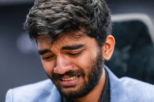 D Gukesh reacts after beating title-holder Ding Liren in the 14th and last game of the FIDE World Chess Championship 2024 in Singapore on Thursday, Dec. 12, 2024