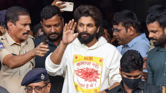 Allu Arjun leaves the state-run Gandhi Hospital after medical check up in Hyderabad on Friday, Dec. 13, 2024