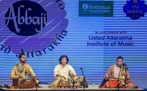 In this Monday, Feb. 3, 2020 file image Tabla maestro Ustad Zakir performs at a concert in Mumbai