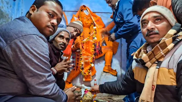 Devotees offer prayers at Shri Kartik Mahadev Temple (Bhasma Shankar temple) that reopened on December 13 after being shut for 46 years, in Sambhal