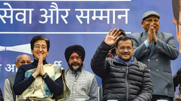 Delhi Chief Minister Atishi and AAP National Convener Arvind Kejriwal during an event, in New Delhi, Wednesday, Dec. 18, 2024.