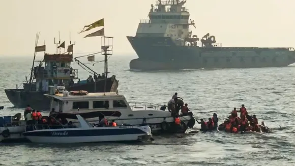 Passengers being rescued after a ferry capsized off Mumbai coast when a Navy craft crashed into it on Wednesday, Dec. 18, 2024.