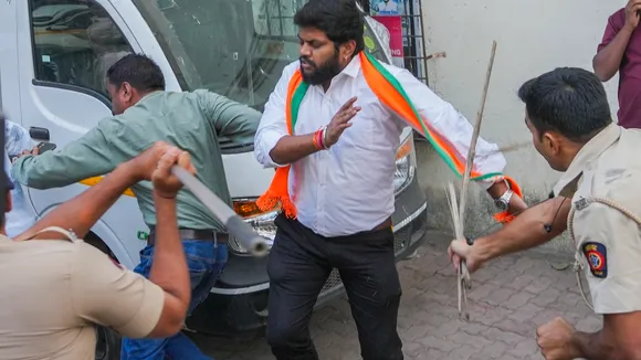 Police personnel lathi-charge to disperse agitators during a protest by Bharatiya Janata Yuva Morcha members outside Congress office in Mumbai on Thursday, Dec. 19, 2024.