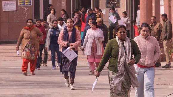 Aspirants leave after appearing for the UPPSC PCS Prelims 2024 in Noida sector-51 on Sunday, Dec. 22, 2024.