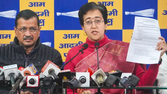 Delhi Chief Minister Atishi and AAP National Convenor Arvind Kejriwal during a press conference in New Delhi on Wednesday, Dec. 25, 2024.