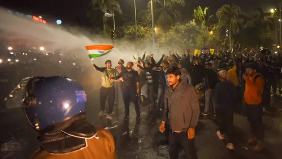 Police use water cannons to disperse aspirants protesting against the alleged paper leak and irregularities in the BPSC 70th Integrated Combined Competitive Examination (CCE), in Patna, Sunday, Dec. 29, 2024.