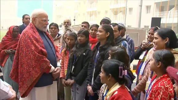 Narendra Modi interacts with the beneficiaries of EWS flats in New Delhi on Friday, January 3, 2025.
