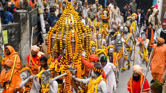 'Naga Sadhus' of 'Shri Taponidhi Anand Akhara Panchayati' take part in a procession towards Sangam ahead of Maha Kumbh Mela 2025 in Prayagraj on Monday, Jan. 6, 2025.