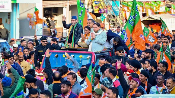 Uttarakhand Chief Minister Pushkar Singh Dhami during a roadshow, in the Herbertpur Nagar Palika area in Dehradun. 