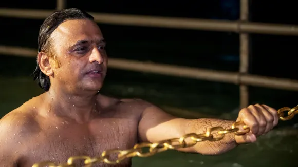In this handout photo provided by Samajwadi Party on Jan. 14, 2025, Samajwadi Party Chief Akhilesh Yadav takes a dip in the River Ganga on Makar Sankranti, in Haridwar.