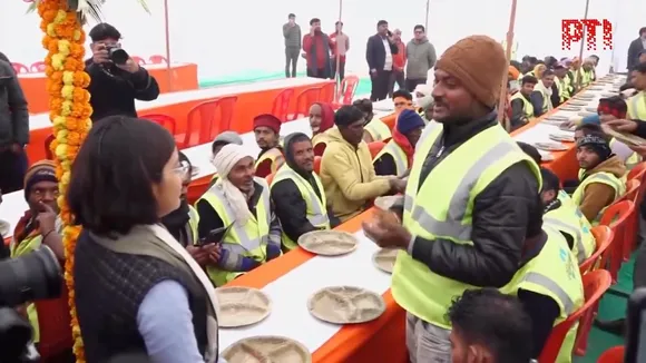 Community lunch organised by the administration for sanitation workers involved in Maha Kumbh Mela 2025 preparations in Prayagraj