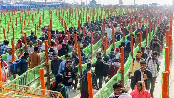 Devotees wait in queues to offer prayers at the Akshayavat Temple during the Maha Kumbh Mela 2025 in Prayagraj on Saturday, Jan. 18, 2025.