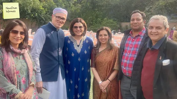 Omar Abdullah and Nidhi Razdan with other journalists in New Delhi on Sunday, Jan 19, 2025.