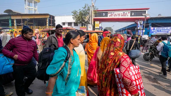 Commuters are seen outside Prayagraj Junction railway station during the ongoing Maha Kumbh Mela in Prayagraj on Friday, Jan. 31, 2025.