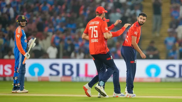 England's bowler Saqib Mahmood celebrates the wicket of India's batter Sanju Samson during the fourth T20 cricket match between India and England, at Maharashtra Cricket Association Stadium in Pune on Friday, Jan. 31, 2025.