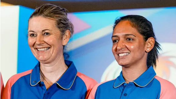 Harmanpreet Kaur with Charlotte Edwards