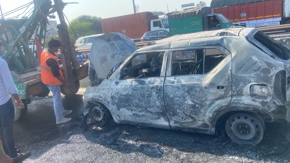A car catches fire on Hero Honda Chowk flyover in Gurugram on Tuesday, Feb 18. 2025.