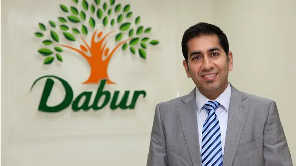 Dabur Group Chairman Malhotra image