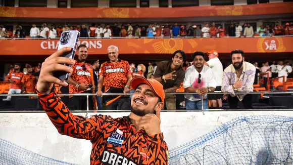 Sunrisers Hyderabad player Ishan Kishan clicks selfies with fans while celebrating the victory during the IPL 2025 match between Sunrisers Hyderabad and Rajasthan Royals at Rajiv Gandhi International Cricket Stadium in Hyderabad on Sunday, March 23, 2025.