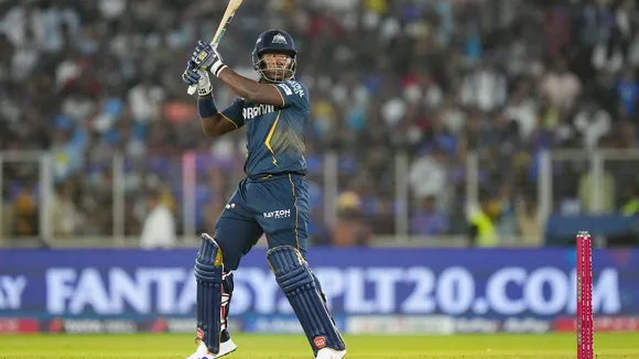 Gujarat Titans' Sherfane Rutherford plays a shot during IPL 2025 T20 match against Mumbai Indians, at the Narendra Modi Stadium in Ahmedabad on Saturday, March 29, 2025.