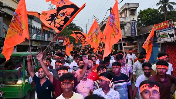 People take part in a religious procession on the occasion of Ram Navami in Nadia, West Bengal on Sunday, April 6, 2025.
