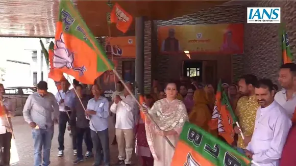 Kangana Ranaut hosts BJP flag during foundation day celebration at her residence.