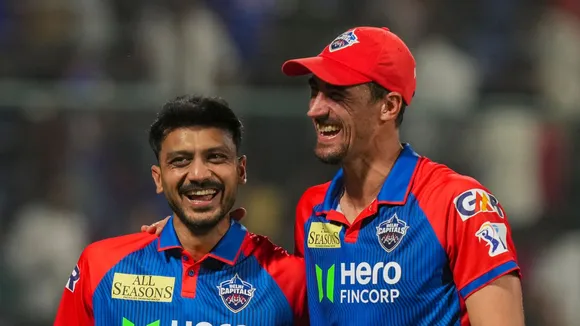 DC's Axar Patel and M Starc celebrate their win in IPL 2025 cricket match against RR at Arun Jaitley Stadium in New Delhi.